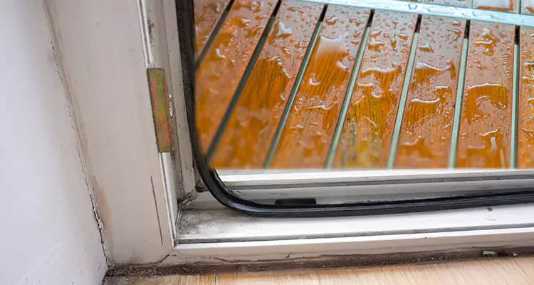 Water Leaking Wooden Patio Doors Repair in Belmont, CA